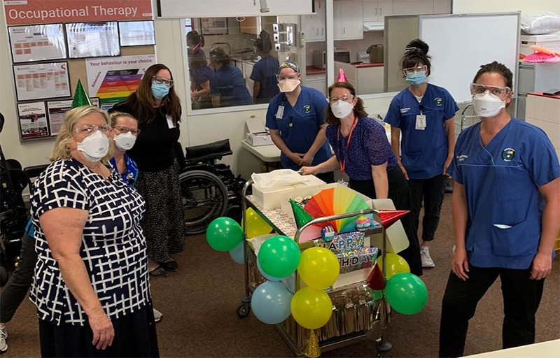 OPH 60th Birthday Physio Team with cupcakes