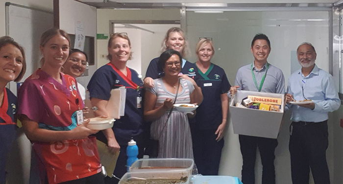 Kien Chan, Stroke Consultant and staff on Ward 5 with the hamper which was kindly donated by the patient's wife.